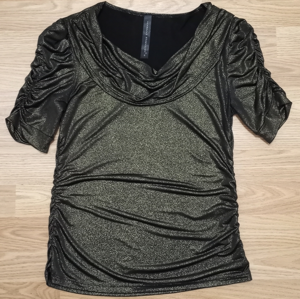 Isabella Rodriguez gold & black top